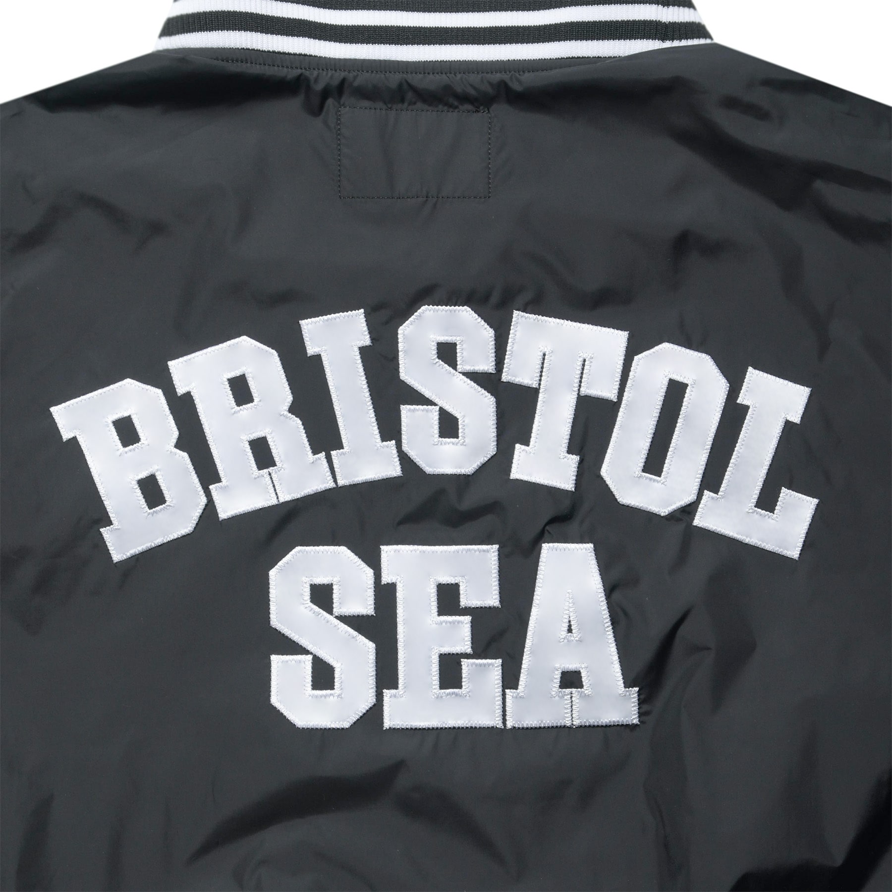 SOPH. | BRISTOL SEA NYLON V-NECK PISTE(L BLACK):